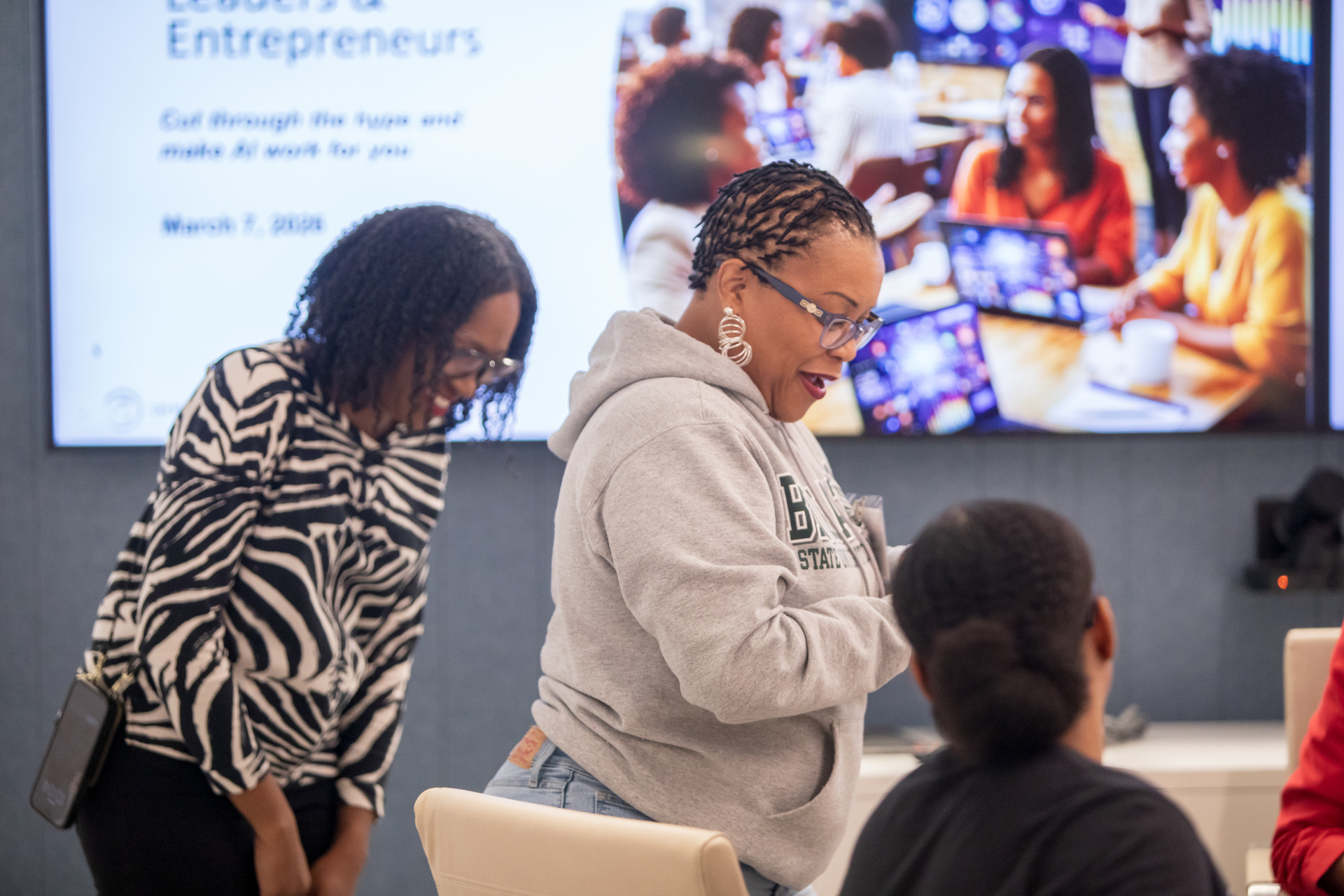 Attendees collaborating during corporate workshop