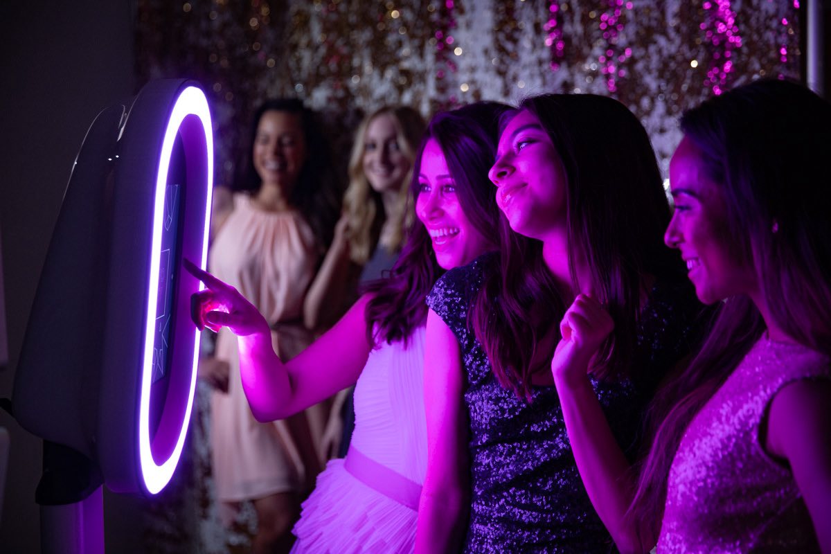 Infinity Classic Booth with purple lighting at event
